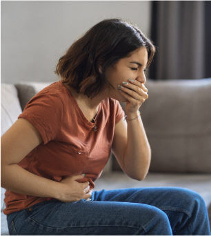 Woman suffering nausea